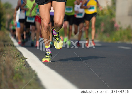 Marathon running race, people feet on city road Marathon running race, people feet on city road 32144206