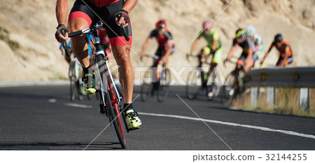 Cycling competition,cyclist athletes riding a race 32144255