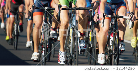 Cycling competition,cyclist athletes riding a race Cycling competition,cyclist athletes riding a race 32144280