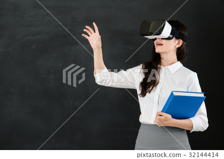 asian woman teacher touch screen with VR headset 32144414