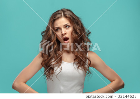 The young woman's portrait with sad emotions The young woman's portrait with sad emotions 32144625