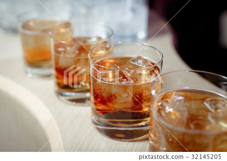 Glasses with whiskey Glasses with whiskey 32145205