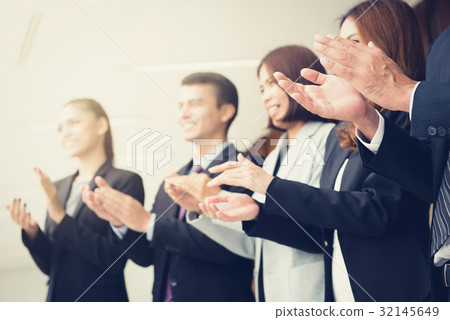 Business people  clapping their hands 32145649