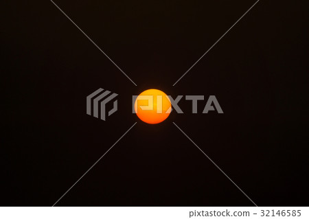 Big sun in the dark sky. 32146585