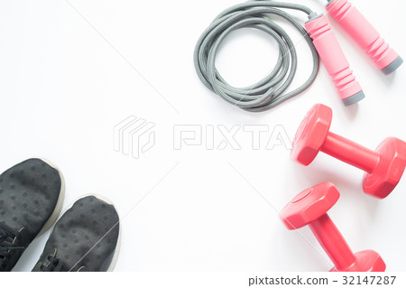 Flat lay of sport and fitness equipments on white  32147287