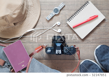 Flat lay of travel items with camera Flat lay of travel items with camera 32147851