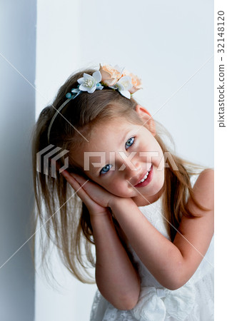 Charming girl with long ash-blond hair , lively Charming girl with long ash-blond hair , lively 32148120