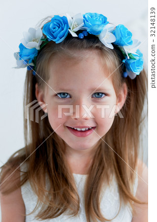 Charming girl with long ash-blond hair , lively 32148139