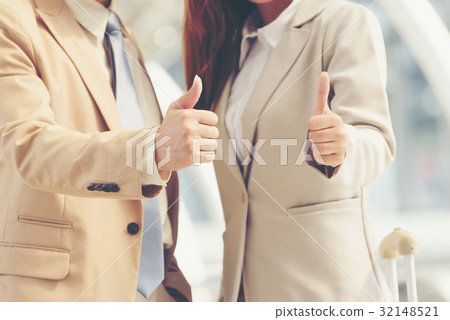 Happy successful business people showing thumb up Happy successful business people showing thumb up 32148521