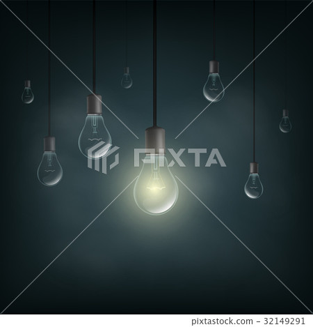 Light bulb is lit in the dark. 32149291