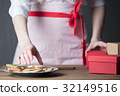 Housewife prepare gingerbread cookies as gift 32149516