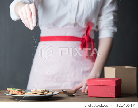 Housewife prepare gingerbread cookies as gift Housewife prepare gingerbread cookies as gift 32149517