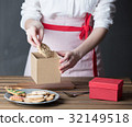 Housewife prepare gingerbread cookies as gift 32149518