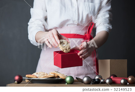 Housewife prepare gingerbread cookies as gift Housewife prepare gingerbread cookies as gift 32149523