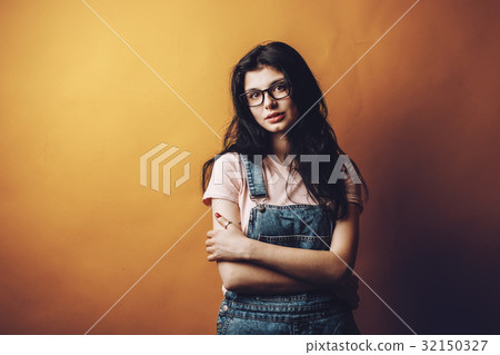 Portrait of smart beautiful brunette girl in 32150327