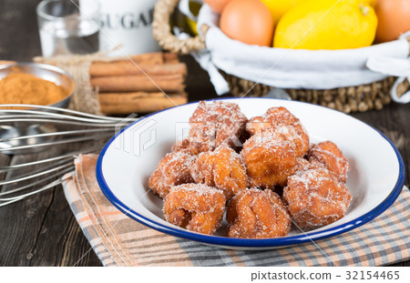 Homemade fritters with sugar Homemade fritters with sugar 32154465