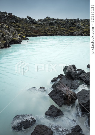 Iceland, Blue lagoon coastal landscape with rocks 32155133