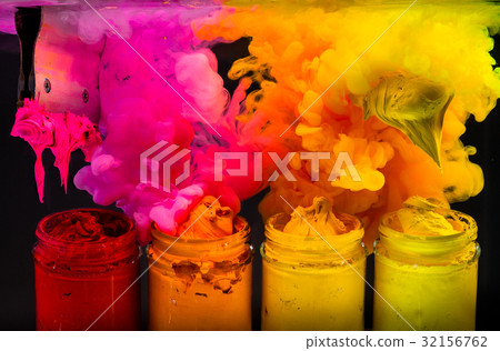 splash water color ink into the hot tone color  32156762