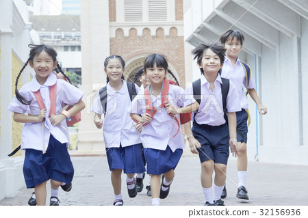 Students are running happily to school Students are running happily to school 32156936