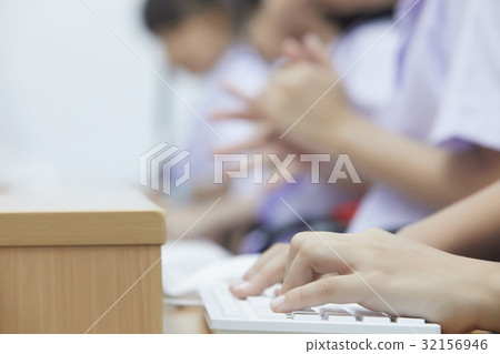 students are typing on keyboard in the computer lesson students are typing on keyboard in the computer lesson 32156946