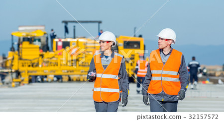two engineers at airport runway two engineers at airport runway 32157572