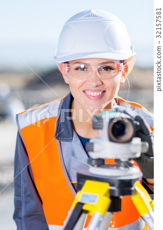 Surveyor with theodolite level Surveyor with theodolite level 32157581
