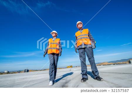 two engineers at airport runway two engineers at airport runway 32157587