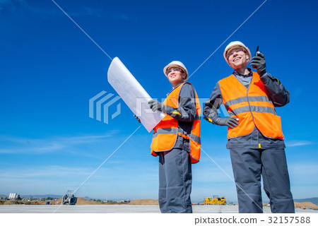 two engineers at airport runway two engineers at airport runway 32157588