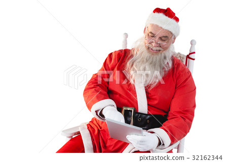 Santa claus using digital tablet 32162344