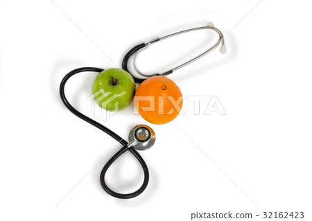 Stethoscope, orange, apple on white background 32162423