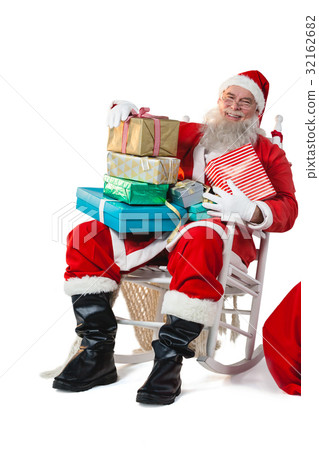 Portrait of santa claus holding a presents Portrait of santa claus holding a presents 32162682