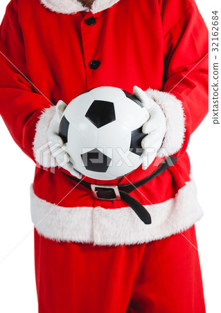 Santa claus holding a football Santa claus holding a football 32162684