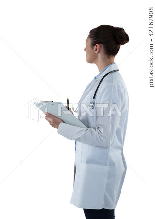 Female doctor holding clipboard and looking away Female doctor holding clipboard and looking away 32162908