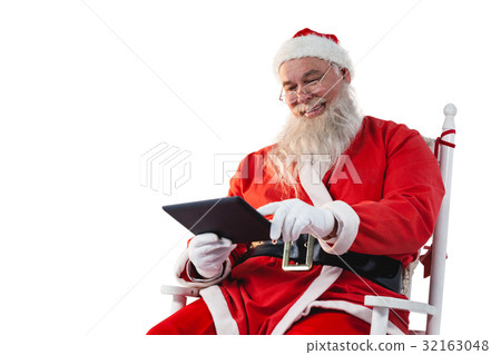 Santa claus using digital tablet 32163048