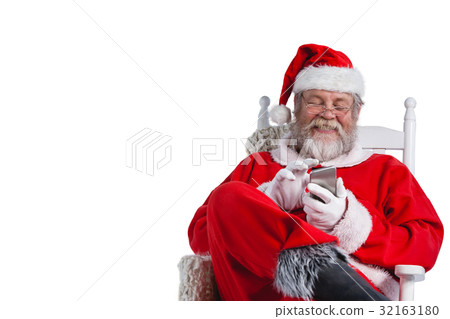 Santa claus using mobile phone Santa claus using mobile phone 32163180