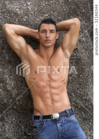 Portrait of a sexy man with perfect muscular body 32168344