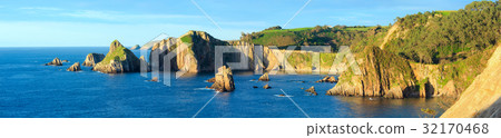 Evening Atlantic ocean coastline landscape. Evening Atlantic ocean coastline landscape. 32170468