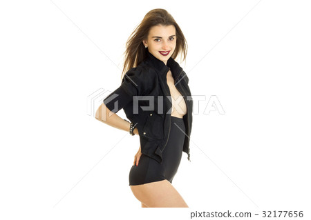 attractive slender Lady in black suit poses on attractive slender Lady in black suit poses on 32177656