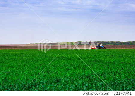 Field treatment by tractor Field treatment by tractor 32177741