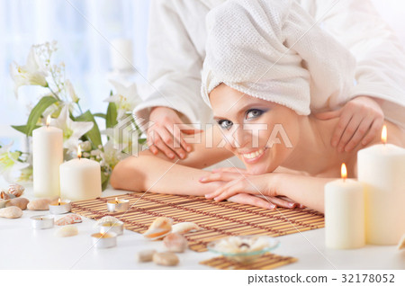 Young woman having massage Young woman having massage 32178052