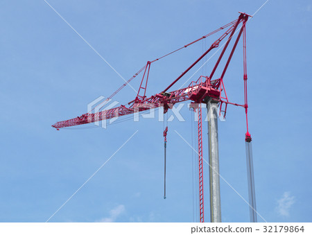 red construction crane on blue sky 32179864