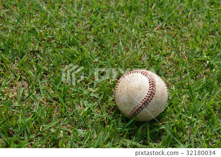 High school baseball hardball practice ball and natural lawn 32180034