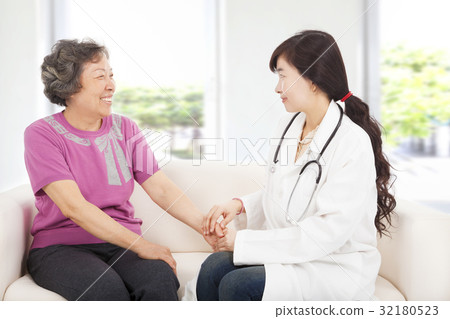 friendly doctor caring senior woman indoor room 32180523
