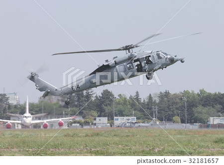 MH - 60S Nighthawk multi - purpose helicopter of the US Navy in Japan who is also active in disaster dispatch during rescue exercise at the Atsugi base runway MH - 60S Nighthawk multi - purpose helicopter of the US Navy in Japan who is also active in disaster dispatch during rescue exercise at the Atsugi base runway 32181657