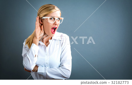 Young woman listening Young woman listening 32182773