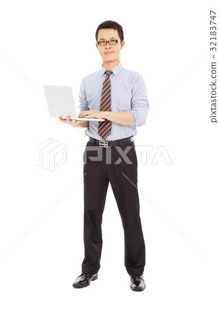 computer engineer standing and holding the laptop 32183747