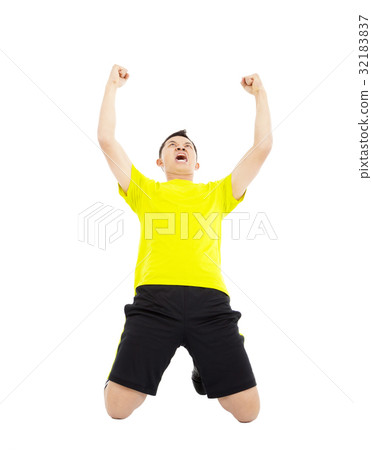 soccer player raised hands to celebrate winner 32183837