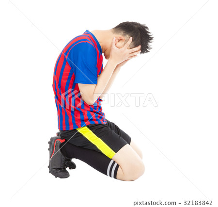 flushed football player kneeling down flushed football player kneeling down 32183842