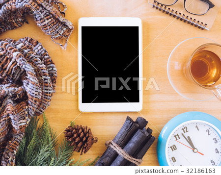 tablet with tea cup,clock and christmas decor tablet with tea cup,clock and christmas decor 32186163
