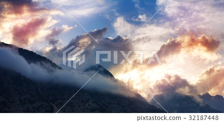 Mountain landscape with tops in clouds 32187448